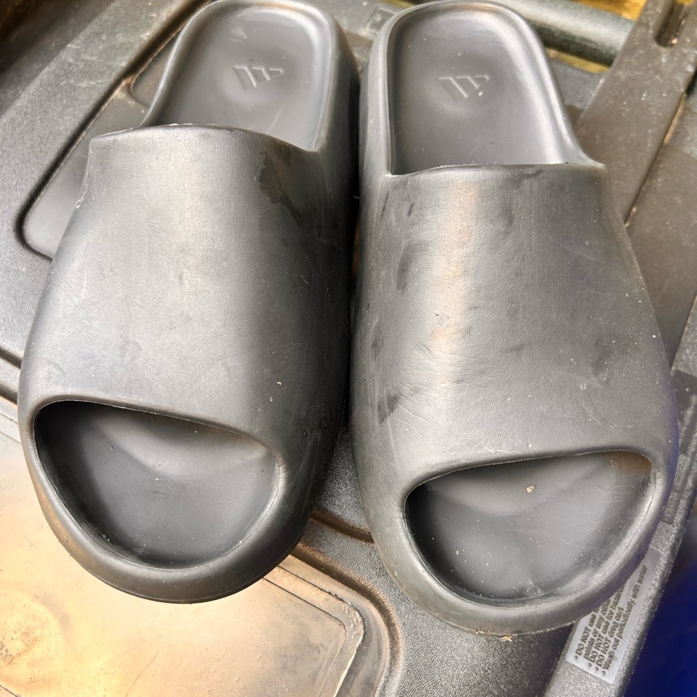Black adidas Yeezy slides